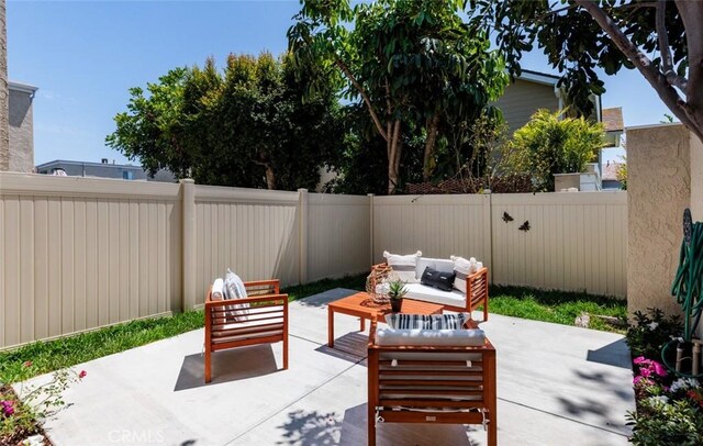 81 Golden Glen St Unit 1, Irvine, CA 92604 - fenced backyard featuring a patio area and an outdoor living space