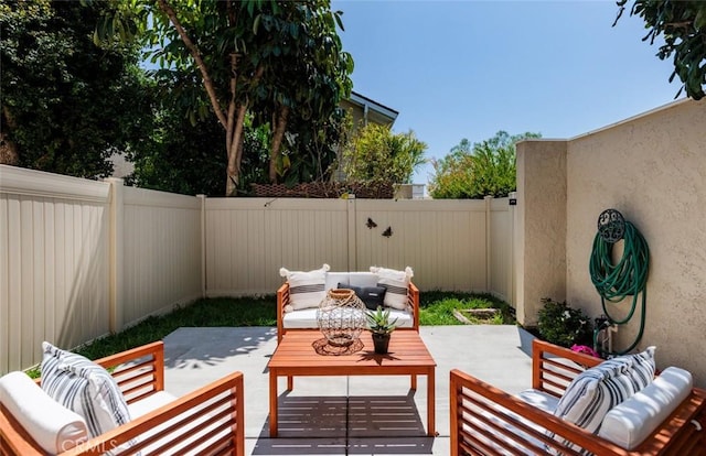 81 Golden Glen St Unit 1, Irvine, CA 92604 - fenced backyard with outdoor lounge area and a patio
