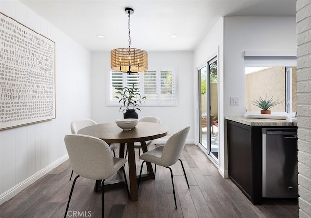 81 Golden Glen St Unit 1, Irvine, CA 92604 - dining room with dark wood-style floors and a chandelier