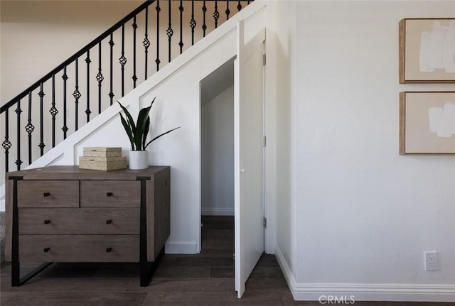 81 Golden Glen St Unit 1, Irvine, CA 92604 - staircase featuring baseboards and wood finished floors