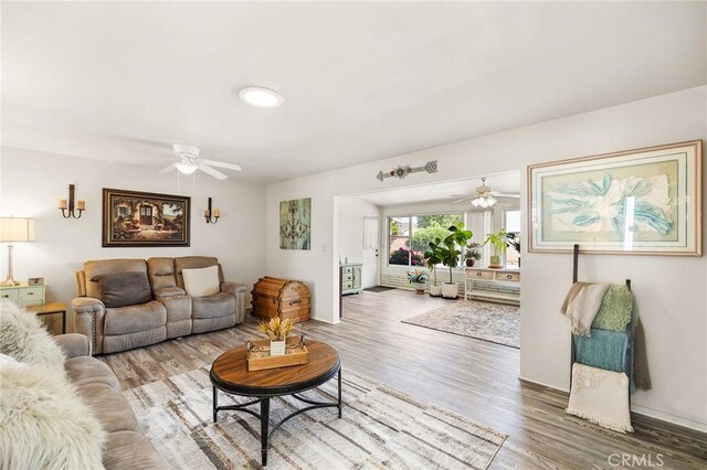25890 Roanoke Rd, Menifee, CA 92586 - living area featuring a ceiling fan and wood finished floors