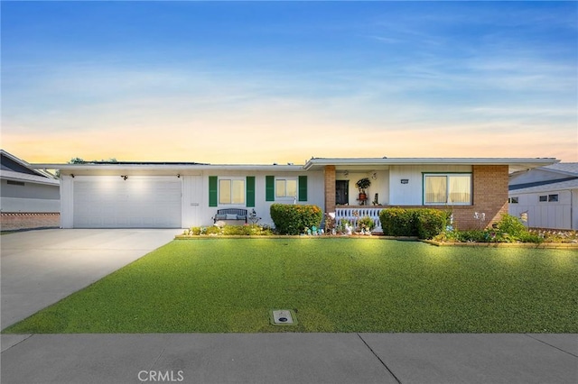 25890 Roanoke Rd, Menifee, CA 92586 - ranch-style home with an attached garage, concrete driveway, covered porch, and a front yard