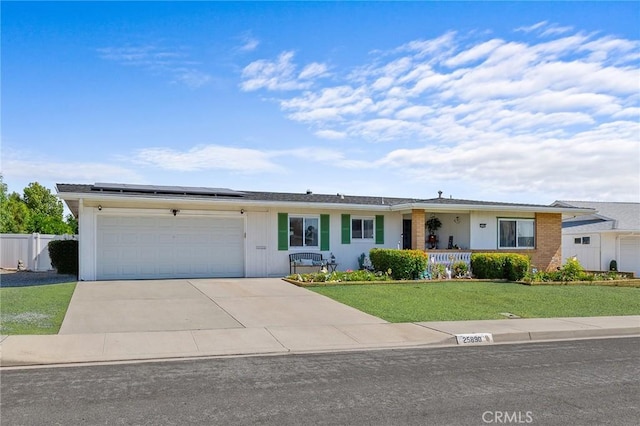 25890 Roanoke Rd, Menifee, CA 92586 - single story home with a garage, concrete driveway, solar panels, and covered porch