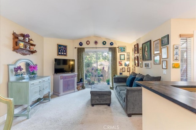 3555 Grove St Unit 231, Lemon Grove, CA 91945 - living room with light carpet and lofted ceiling