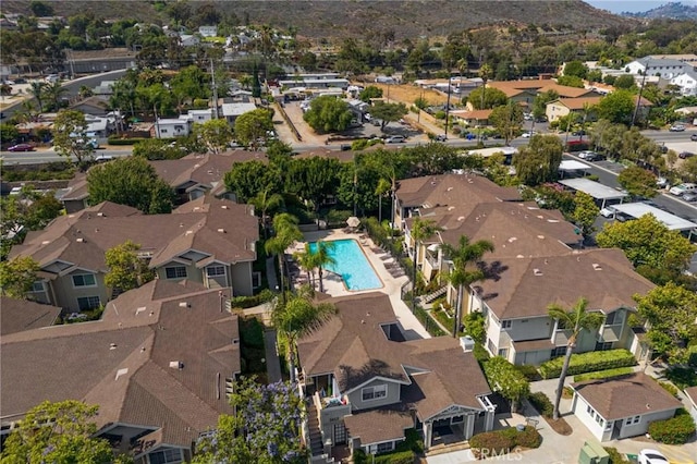 3555 Grove St Unit 231, Lemon Grove, CA 91945 - aerial overview of property's location with nearby suburban area and a mountain backdrop