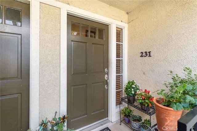 3555 Grove St Unit 231, Lemon Grove, CA 91945 - view of exterior entry featuring stucco siding