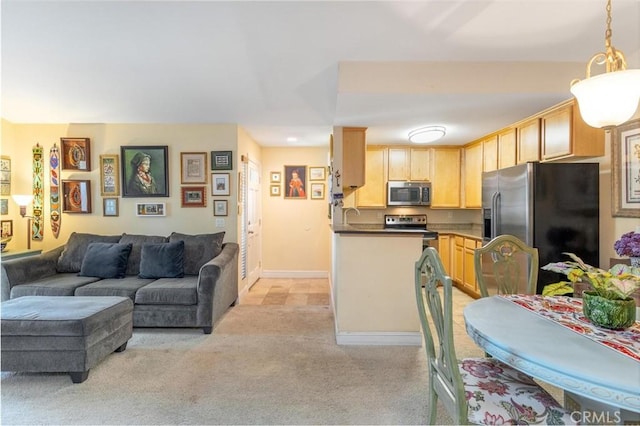 3555 Grove St Unit 231, Lemon Grove, CA 91945 - living area featuring light carpet and baseboards