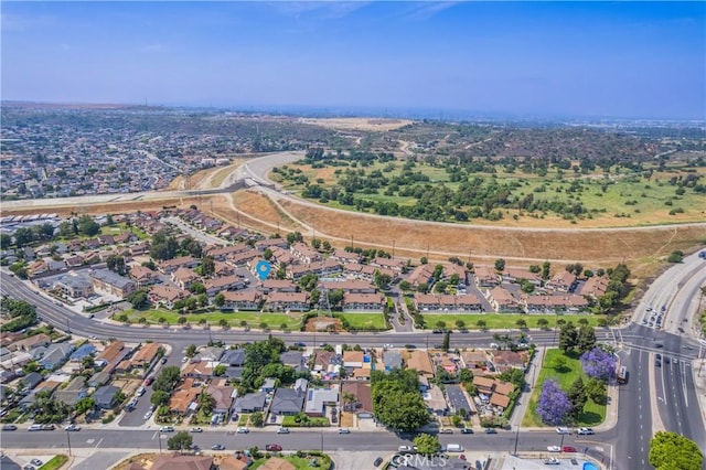 8939 Gallatin Rd Unit 68, Pico Rivera, CA 90660 - aerial view of property and surrounding area featuring nearby suburban area