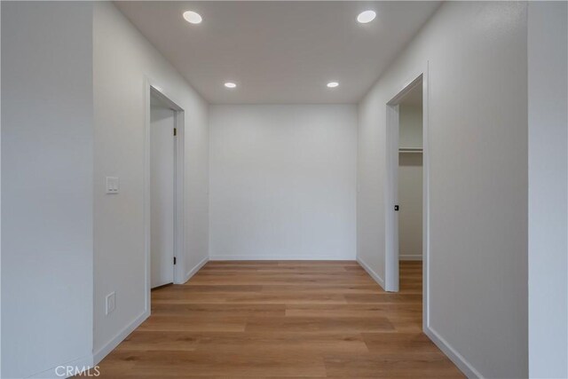 8939 Gallatin Rd Unit 68, Pico Rivera, CA 90660 - hallway with recessed lighting and light wood-type flooring