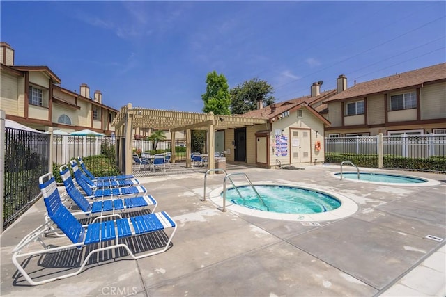 8939 Gallatin Rd Unit 68, Pico Rivera, CA 90660 - view of pool featuring a community hot tub, a patio area, a pergola, and a swimming pool