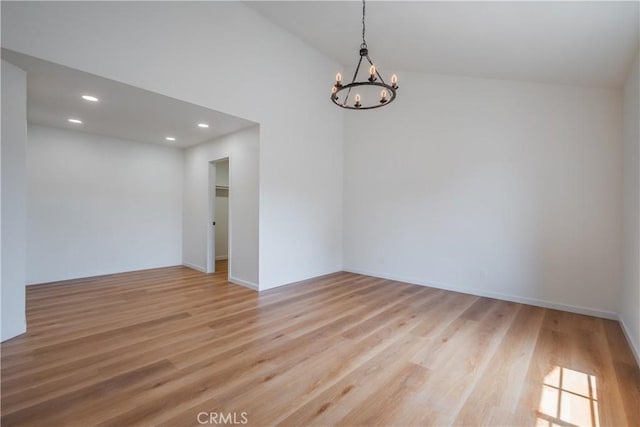 8939 Gallatin Rd Unit 68, Pico Rivera, CA 90660 - empty room featuring a chandelier, light wood finished floors, and recessed lighting