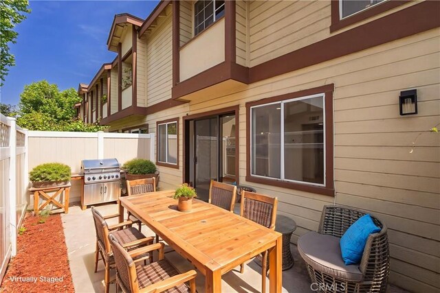 8939 Gallatin Rd Unit 68, Pico Rivera, CA 90660 - view of patio / terrace featuring grilling area and outdoor dining space