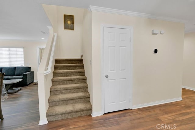 9142 San Luis Obispo Ln, Riverside, CA 92508 - stairs featuring crown molding and wood finished floors
