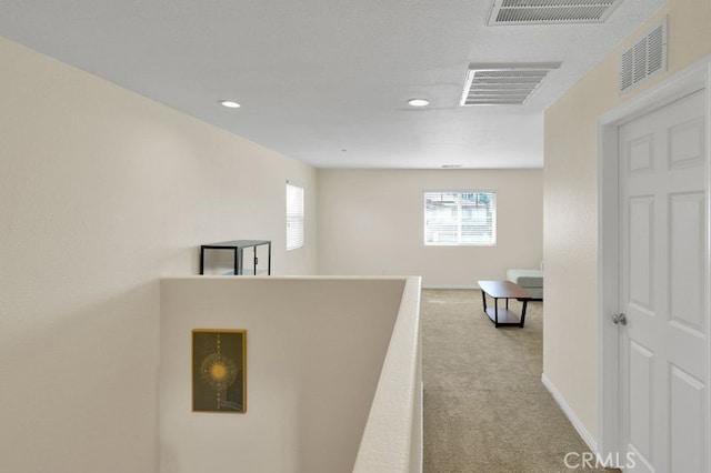 9142 San Luis Obispo Ln, Riverside, CA 92508 - hallway with light carpet and recessed lighting