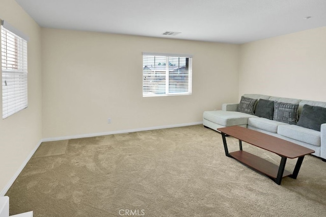 9142 San Luis Obispo Ln, Riverside, CA 92508 - living area featuring carpet flooring and baseboards
