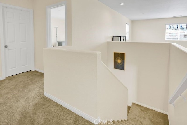 9142 San Luis Obispo Ln, Riverside, CA 92508 - hallway featuring an upstairs landing, carpet flooring, and recessed lighting
