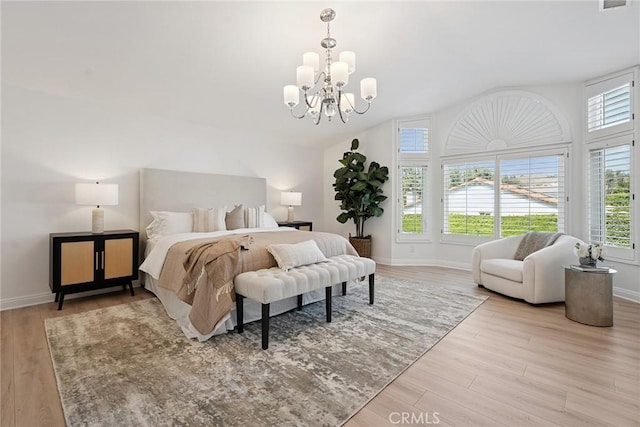 6137 Rustling Oaks Dr, Agoura Hills, CA 91301 - bedroom featuring a chandelier, wood finished floors, and lofted ceiling