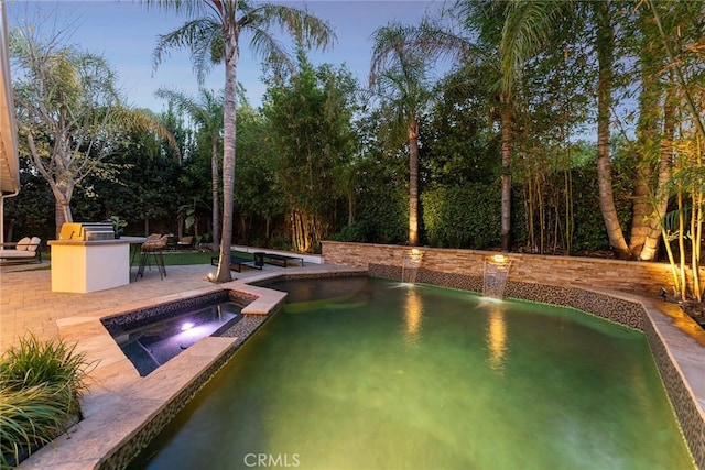 6137 Rustling Oaks Dr, Agoura Hills, CA 91301 - view of pool with a pool with connected hot tub and a patio area