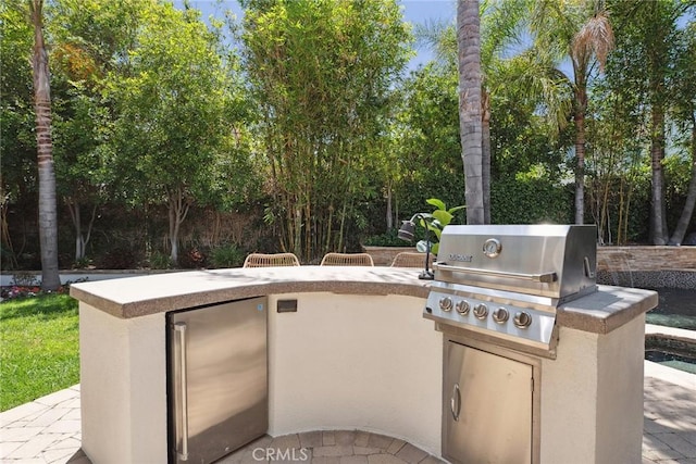 6137 Rustling Oaks Dr, Agoura Hills, CA 91301 - view of patio featuring exterior kitchen and view of scattered trees