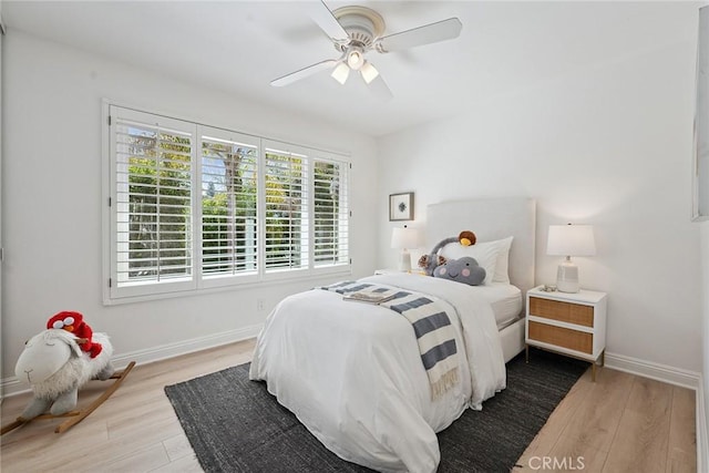 6137 Rustling Oaks Dr, Agoura Hills, CA 91301 - bedroom with wood finished floors and ceiling fan