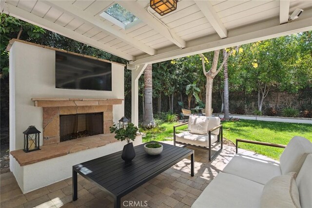 6137 Rustling Oaks Dr, Agoura Hills, CA 91301 - view of patio / terrace featuring an outdoor living space with a fireplace