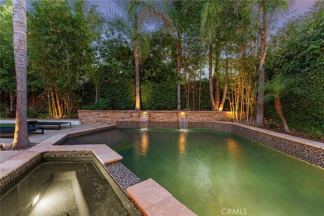 6137 Rustling Oaks Dr, Agoura Hills, CA 91301 - view of swimming pool with a pool with connected hot tub