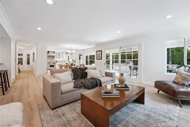 6137 Rustling Oaks Dr, Agoura Hills, CA 91301 - living area with recessed lighting, light wood-type flooring, and a chandelier