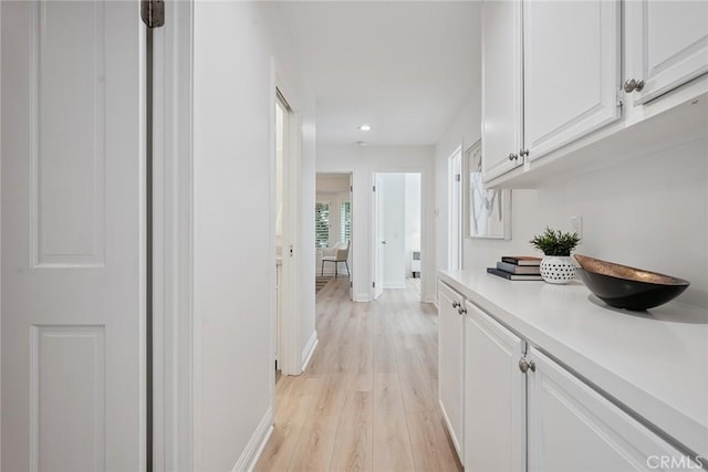 6137 Rustling Oaks Dr, Agoura Hills, CA 91301 - hall featuring light wood-style flooring, recessed lighting, and radiator heating unit