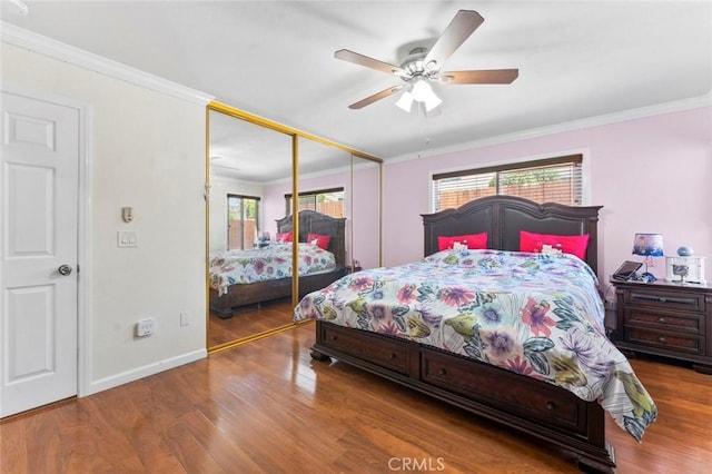 8950 Brentford Ave, San Diego, CA 92126 - bedroom with crown molding, wood finished floors, a closet, and ceiling fan