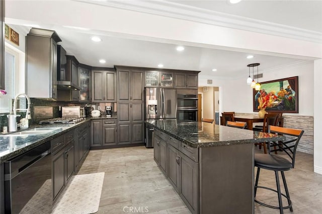 8950 Brentford Ave, San Diego, CA 92126 - kitchen featuring stainless steel appliances, a center island, crown molding, glass insert cabinets, and a kitchen breakfast bar