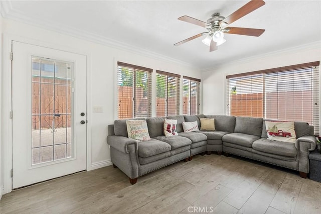 8950 Brentford Ave, San Diego, CA 92126 - living room with light wood-style floors, ornamental molding, and a ceiling fan
