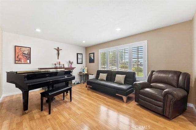 8950 Brentford Ave, San Diego, CA 92126 - living area with light wood-type flooring and recessed lighting