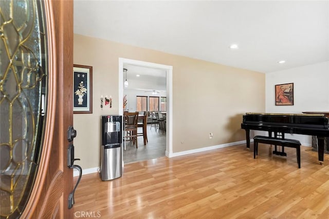 8950 Brentford Ave, San Diego, CA 92126 - sitting room with light wood finished floors, recessed lighting, and a ceiling fan