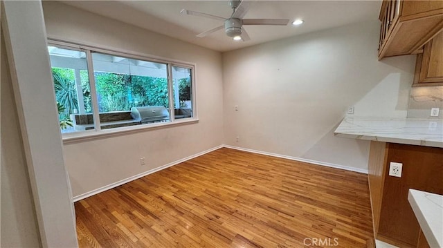 15936 Osborne St, North Hills, CA 91343 - unfurnished dining area with light wood-style floors, ceiling fan, and recessed lighting
