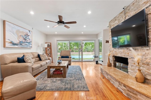 15936 Osborne St, North Hills, CA 91343 - living room featuring a ceiling fan, wood finished floors, a fireplace, and recessed lighting