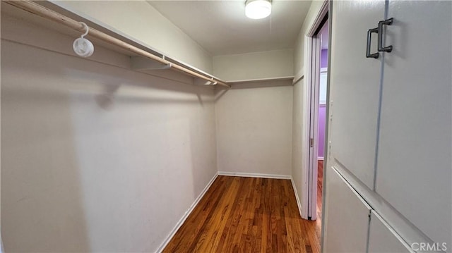 15936 Osborne St, North Hills, CA 91343 - walk in closet with wood finished floors