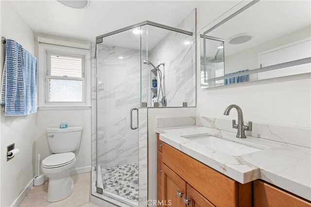 15936 Osborne St, North Hills, CA 91343 - bathroom featuring vanity, a marble finish shower, and tile patterned floors