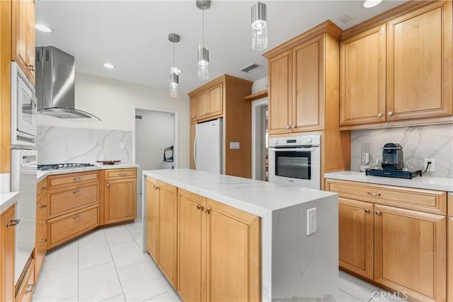 15936 Osborne St, North Hills, CA 91343 - kitchen featuring white appliances, wall chimney exhaust hood, backsplash, a kitchen island, and hanging light fixtures