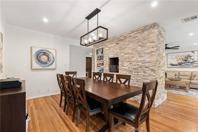 15936 Osborne St, North Hills, CA 91343 - dining area featuring light wood-type flooring, recessed lighting, and a chandelier