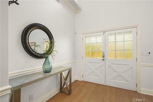 22550 Flamingo St, Woodland Hills, CA 91364 - doorway to outside featuring wood finished floors and baseboards