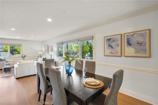 22550 Flamingo St, Woodland Hills, CA 91364 - dining space with light wood-style flooring, ornamental molding, and recessed lighting