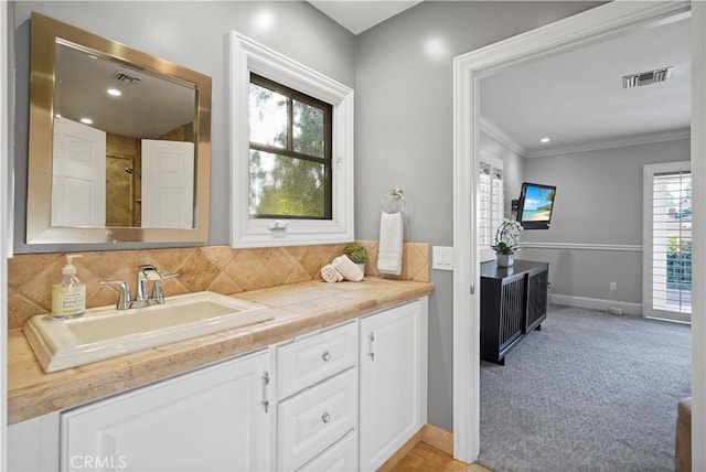 22550 Flamingo St, Woodland Hills, CA 91364 - full bathroom featuring vanity, ornamental molding, a shower, tasteful backsplash, and recessed lighting