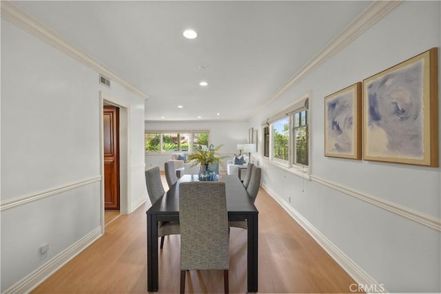 22550 Flamingo St, Woodland Hills, CA 91364 - dining room with ornamental molding, light wood-style floors, and recessed lighting