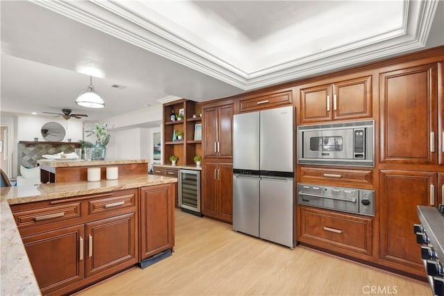 22550 Flamingo St, Woodland Hills, CA 91364 - kitchen with appliances with stainless steel finishes, beverage cooler, a warming drawer, light wood-type flooring, and a ceiling fan