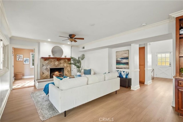 22550 Flamingo St, Woodland Hills, CA 91364 - living area featuring crown molding, ceiling fan, light wood-type flooring, a fireplace, and recessed lighting