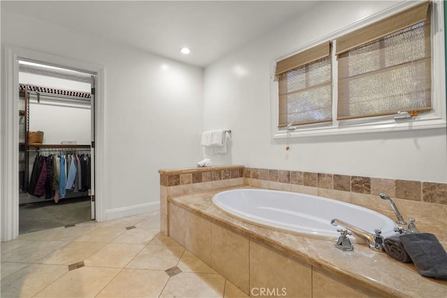 22550 Flamingo St, Woodland Hills, CA 91364 - bathroom with a bath, tile patterned floors, a spacious closet, and recessed lighting