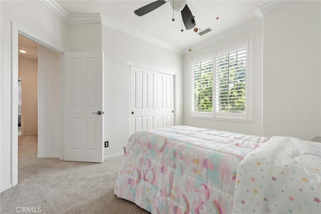 72 Westwind Dr, Tustin, CA 92782 - carpeted bedroom featuring ornamental molding, a closet, and a ceiling fan