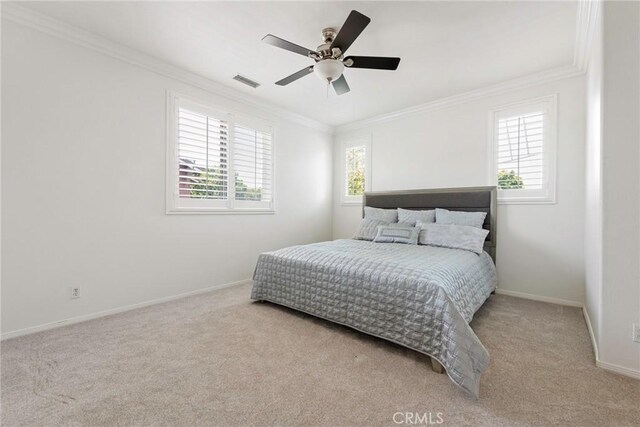 72 Westwind Dr, Tustin, CA 92782 - bedroom featuring carpet flooring, crown molding, and a ceiling fan