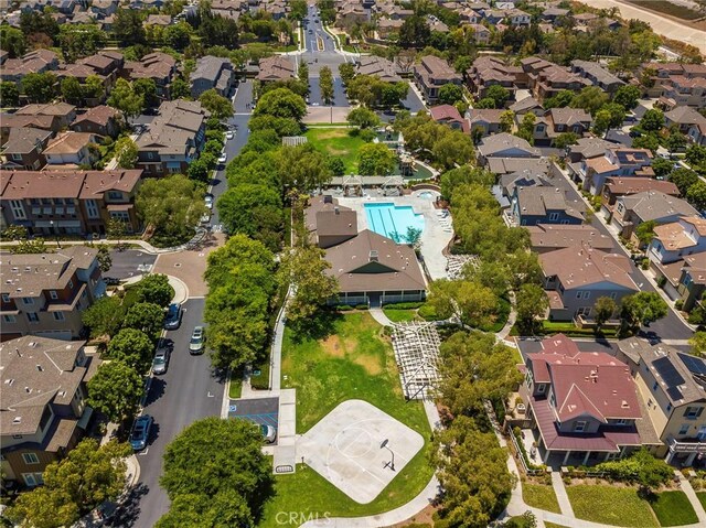 72 Westwind Dr, Tustin, CA 92782 - aerial overview of property's location featuring a pool area and nearby suburban area