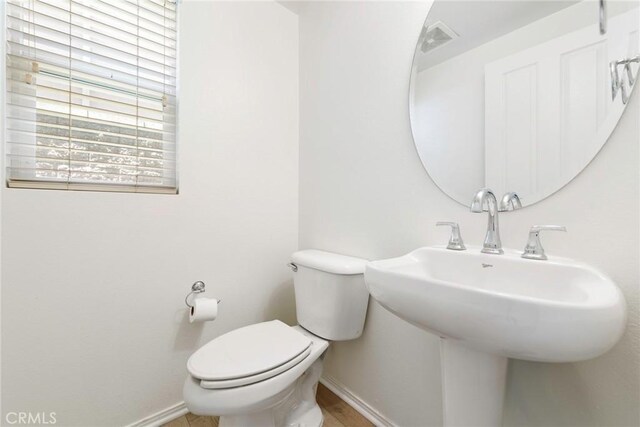 72 Westwind Dr, Tustin, CA 92782 - half bath featuring toilet and a sink